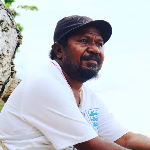 Agustinus Norton Karubuy, S.IP, M.Si, aktivis Papua 