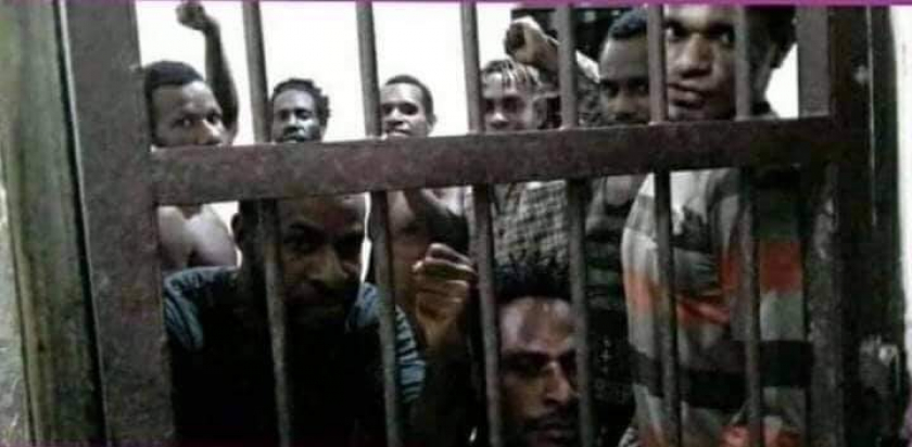 Para aktivis yang ditahan di Polres Merauke. [Foto: Facebook Marinus Yaung]