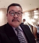 Ketua PGRI Kota Ternate, Isman Do. Idris . [Foto: Dok. Facebook Isman Do Idris]