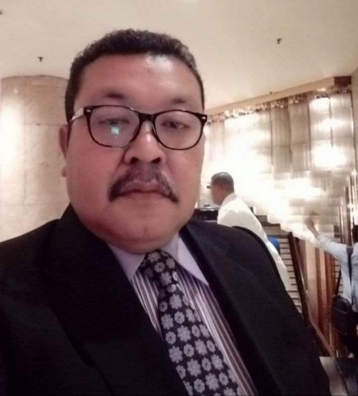 Ketua PGRI Kota Ternate, Isman Do. Idris . [Foto: Dok. Facebook Isman Do Idris]